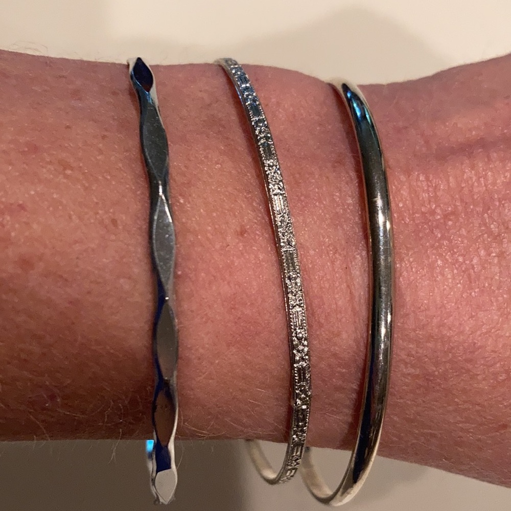 Three Silver Bracelets